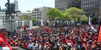 Cosatu's secretary in the Western Cape, Tony Ehrenreich, addresses protesters  outside Parliament on 27 September 2017 in Cape Town. (Photo: Gallo Images / Brenton Geach)