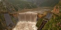 Overflowing Kouga Dam leads to evacuations along flooded river valley 
