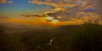 Sunset over Hluhluwe River, Hluhluwe Game Park.