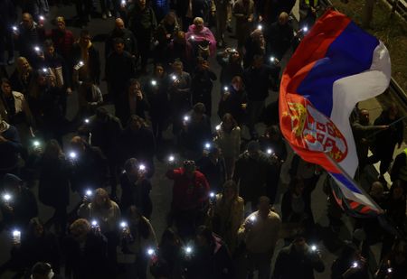 Shots fired outside Serbian parliament, one man detained, local media report