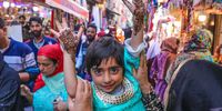 A Kashmiri girl displays her henna painted hands at a market ahead of Eid al-Fitr holiday, in Srinagar, the summer capital of Indian Kashmir, 08 April 2024. Eid al-Fitr is an Islamic holiday that marks the end of Ramadan, and is celebrated during the first three days of Shawwal, the 10th month of the Islamic calendar. It is expected to begin on 10 or 11 April 2024, depending on the lunar calendar.  EPA-EFE/FAROOQ KHAN