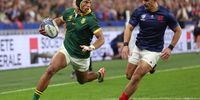 Springbok Kurt-Lee Arendse breaks through to score his team’s first try in the 2023 Rugby World Cup quarterfinal . (Photo: Warren Little / Getty Images)