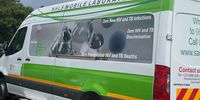 One of 60 new mobile laboratories ready to roll onto the streets of South Africa after the launch in Johannesburg on 1 April. The numbers of the Covid-19 information hotlines are printed on the back of the van. (Photo: Department of Health)