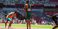 TOKYO, JAPAN - AUGUST 05: Chederick van Wyk of South Africa at the 200m mark, looks back as his teammates drop the baton in the mens 4x100m relay heats during the Athletics event on Day 13 of the Tokyo 2020 Olympic Games at the Olympic Stadium on August 05, 2021 Tokyo, Japan. (Photo by Roger Sedres/Gallo Images/Getty Images)