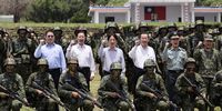 Taiwanese President Willaim Lai (C), Defense Minister Wellington Koo (C-R), and National Security Council Secretary-General Joseph Wu Jaushieh (C-L) pose with new army recruits at a military camp in Taichung, Taiwan, 28 June 2024. Lai visited the camp to observe the training of new recruits amid ongoing tensions between China and Taiwan.  EPA-EFE/RITCHIE B. TONGO