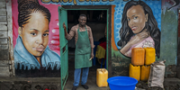 Mohimbo (48) poses in front of his hairdressing salon in Goma, Democratic Republic of Congo, 26 November 2022. On the N2 highway leading north out of Goma in the Democratic Republic of Congo, colourful hair salon storefronts hide interiors full of customers. The customers are mostly women who are ready to spend their entire day getting the perfect hairstyle, whether it’s butterfly or tribal braids, or curly hair twists. Yet while most of the work is performed by women, it seems that the salons are owned by men, some as young as 20 years old. At a time of tension and economic uncertainty, the bold names and brightly coloured storefronts bring a sense of normalcy to residents who have contended with conflict and natural disasters for decades. The Salon Mixte, the Clinique de Beauté, the Just Love salon and the Salon King are all open for business and here to stay. Despite fighting between M23 rebels and FARDC government forces north of Goma, life goes on for residents of the lakeside town. © Jerome Delay, France, Shortlist, Professional competition, Portraiture, Sony World Photography Awards 2023