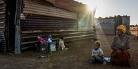 Onica Van Bondes, 61, sits outside her shack in Ratanang, Klerksdorp. Van Bondes says life is difficult without basic necessities such as electricity and running water.<br>Photo: Shiraaz Mohamed.