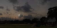 Darkness falls as people watch the total solar eclipse on April 8th 2024 in Fairfield, Texas, USA. Photographer: Jane Berg