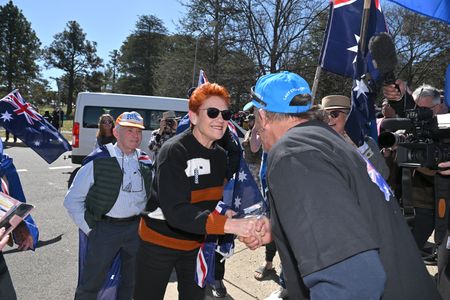 Australian far-right senator wears burqa to parliament, sparking outrage
