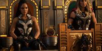 (L-R): Tessa Thompson as Valkyrie and Natalie Portman as Mighty Thor in Marvel Studios' 'Thor: Love and Thunder'. Image: Jasin Boland / © Marvel Studios 2022. 