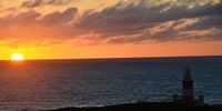  Sunrise in Cape Agulhas over the Cape Agulhas lighthouse. Image: Ilse Zietsman