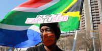 JOHANNESBURG, SOUTH AFRICA - AUGUST 12: Participants from Ahmed Kathrada Foundation, OUTA, SACP, Defend Our Democracy Campaign and Right To Know protest outside the Zondo Commission during the appearance of President Cyril Ramaphosa on August 12, 2021 in Johannesburg, South Africa. (Photo by Gallo Images/Fani Mahuntsi)