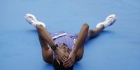 Ethiopian athlete Yomif Kejelcha reacts after breaking a new world record with a time of 57 minutes and 30 seconds, during the Valencia's Half Marathon held in Valencia, eastern Spain, 27 October 2024.  EPA-EFE/Biel Alino