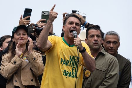 Thousands of Brazilians rally for Bolsonaro in tight presidential race against Lula