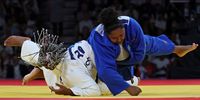 Romane Dicko of France (white) and Beatriz Souza of Brazil (blue) in action during their Women +78kg Semifinal bout of the Judo competitions in the Paris 2024 Olympic Games, at the Champs-de-Mars Arena in Paris, France, 02 August 2024.  EPA-EFE/DANIEL IRUNGU