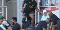 South African Springboks captain Siya Kolisi (centre) walks with his right knee strapped during their team's training session at Loftus Versfeld Stadium in Pretoria on 14 June, 2023 ahead of the upcoming Rugby Championship in July, 2023. (Photo: Phill Magakoe / AFP)