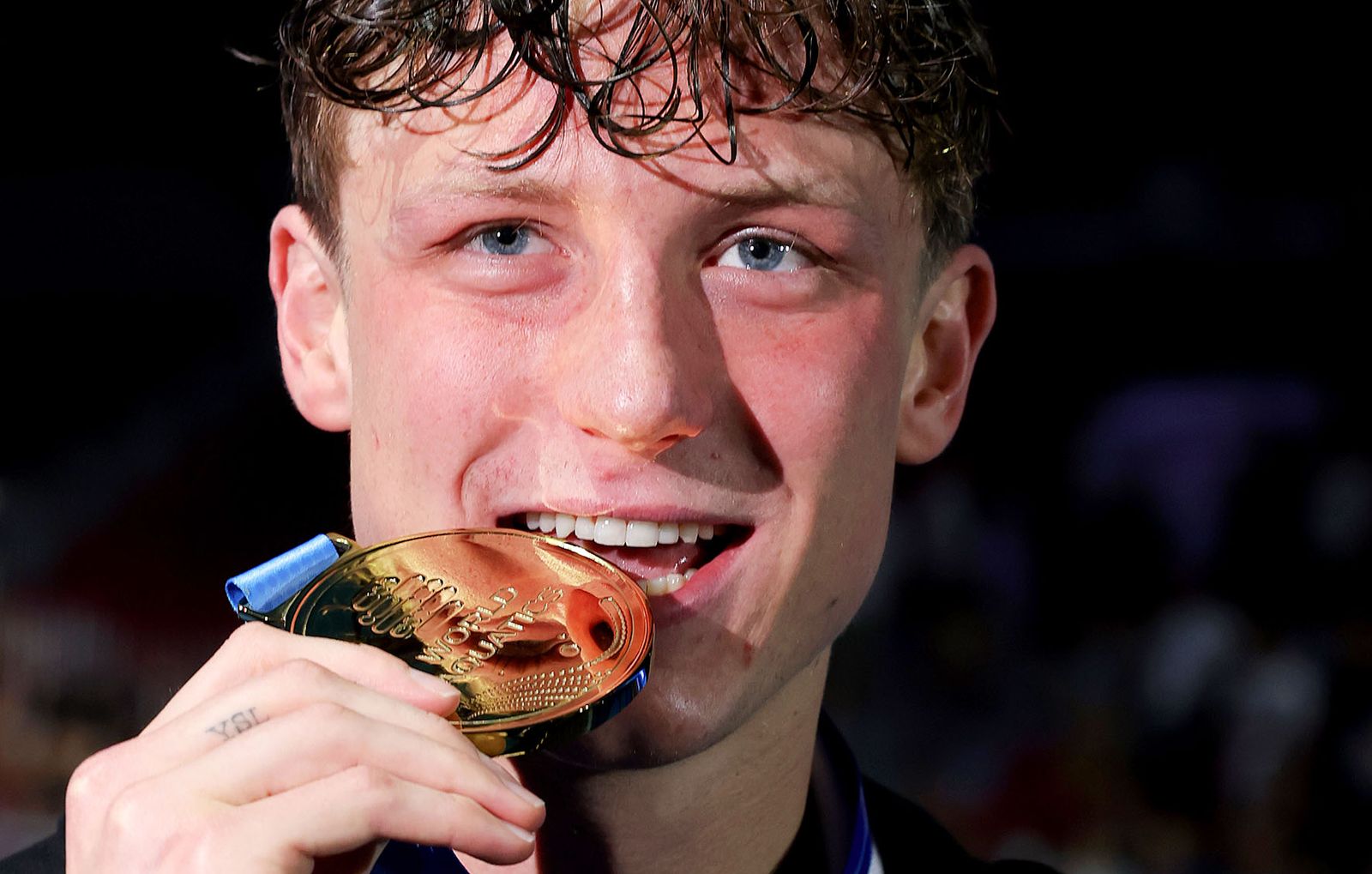 Gold medalist Pieter Coetze of Team South Africa poses during the Men’s 100m Backstroke medal ceremony on day 19 of the Singapore 2025 World Aquatics Championsh