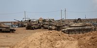 Israeli tanks and armoured vehicles are deployed along the Israel-Gaza border in southern Israel on 16 September. (Photo: Atef Safadi /EPA)