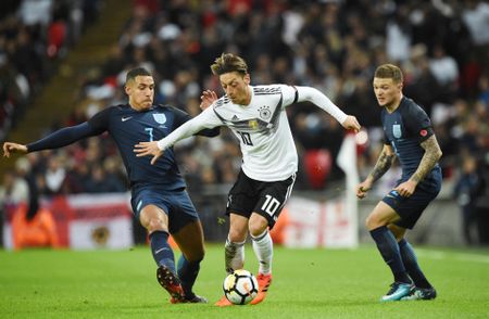 Ozil, citing 'racism', quits Germany side after World Cup debacle