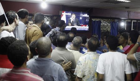 Egypt's President Mursi defies Army as it plots future without him