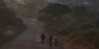 Kids, early morning on a long road to school in Mulenzhe village. (Photo: Felix Dlangamandla)