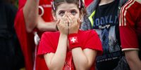 A young Swiss supporter reacts during the public viewing of the FIFA 2018 World Cup Group E soccer match between Switzerland and Brazil, in a fan zone in Lausanne, Switzerland, 17 June  2018.  EPA-EFE/VALENTIN FLAURAUD