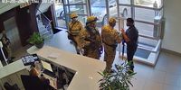 Heavily armed agents entering Horizon's offices. (Sreengrab: Supplied)