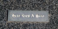 The simple inscription on Dutch Hugo’s gravestone says it all. Image: Chris Marais
