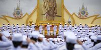 Thai officials salute to the portrait of the King while they take the oath of allegiance to become lawful civil servants to mark Thai King Maha Vajiralongkorn's 72nd birthday at Sanam Luang outside the Grand Palace in Bangkok, Thailand, 28 July 2024. Thai King Maha Vajiralongkorn Bodindradebayavarangkun celebrates his 72nd birthday on 28 July 2024.  EPA-EFE/RUNGROJ YONGRIT