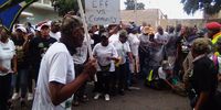Operation Dudula members in front of the Johannesburg Central Police Station in support of their leader Nhlanhla "Lux" Dlamini in Johannesburg, South Africa on Friday 25 March 2022. (Photo: Bheki Simelane)