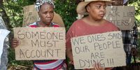 Community and family members picket on the sidelines during rescue operations for trapped miners at the abandoned Buffelsfontein gold mine in Stilfontein, South Africa, on Tuesday, Jan. 14, 2025. It's unclear exactly how many people remain underground and are unable to resurface, with some estimates putting the number at at least 1,000. Photographer: Leon Sadiki/Bloomberg via Getty Images