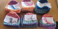 Bonnets that have been knitted for newborns at nearby Tintswalo Hospital. (Photo: Bridget Hilton-Barber)