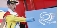 epa10445831 Italian rider Giulio Ciccone of Trek-Segafredo team wears the overall leadership yellow jersey on the podium after the third stage of the Volta a la Comunitat Valenciana, of 145 kilometers between Betera and Sagunto, in Valencia, eastern Spain, 03 February 2023.  EPA-EFE/Manuel Bruque