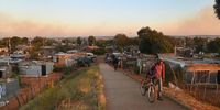 Tin shacks in the Slovo Park informal settlement of Johannesburg on May 6. Across the city, many poor and predominantly Black neighborhoods still lack adequate services. Photographer: Leon Sadiki/Bloomberg