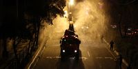 epa08284774 Iranian Firefighters disinfects streets in an effort to halt the spread of coronavirus in Tehran, Iran, early 11 March 2020. According the last report by the Ministry of Health, 8,042 people were diagnosed with the Covid-19 coronavirus and 291 people have died in Iran.  EPA-EFE/ABEDIN TAHERKENAREH