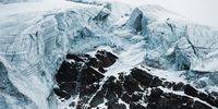 Seracs. To show future generations the splendour of the glaciers that once shaped our Alps, I photographed them from their most intimate side. Each picture tells a specific story of a glacier's characteristics. Together they form a construct that documents the diversity, the complex shapes and structures, as well as the unique colour of the glaciers. This series is a homage to the landscape I have learned to love, but which is disappearing in front of my eyes. This body of work is a portrait of this majestic but fragile and ephemeral world of ice. © Niklas Eschenmoser, Switzerland, Shortlist, Professional, Landscape, 2021 Sony World Photography Awards