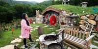 Marija Milicevic outside the Hobbit house in the village of Rakova Noga, near Kresevo, Bosnia and Herzegovina, 13 June 2023. Marija Milicevic, a geological and mining engineer, and her three sisters, Vedrana, Milijana  and Valentina have built the tourist resort 'Hobbiton', based on the film series 'The Lord of the Rings' and represents a new tourist attraction in Bosnia and Herzegovina. The Milicevic sisters used natural materials for the construction of the Hobbit houses, which are also environmentally friendly. Tourists from the region and other European countries have already started visiting the village.  EPA-EFE/FEHIM DEMIR