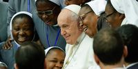 Pope Francis poses with nuns during his weekly general audience in the Paul VI Hall, Vatican City, 28 February 2024.  EPA-EFE/GIUSEPPE LAMI