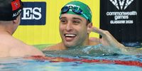 CW Games – Swimmers fly flag