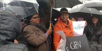 Social Development Minister Lindiwe Zulu accepts a memorandum of demands from the Western Cape Women's Shelter Movement and National Shelter Movement of SA outside Parliament on 23 July. Image: supplied
