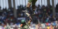 Soldiers perform a drill during Defence Forces Day celebrations at the National Sports Stadium in Harare, Zimbabwe, 15 August 2023. Zimbabweans commemorated the Defence Forces Day which celebrates achievements and strides made by the country's security forces in defending and maintaining peace.  EPA-EFE/AARON UFUMELI