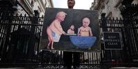 Political satire artist Kaya Mar poses with his artwork depicting US President Trump, Ukraine's President Zelensky and Russian President Putin outside at Downing Street in London, Britain, 13 August 2025. British Prime Minister Starmer co-chaired a Coalition of the Willing meeting at Downing Street ahead of a Trump/Putin summit on 15 August 2025.  EPA/ANDY RAIN