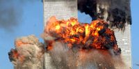 NEW YORk - SEPTEMBER 11, 2001:  (SEPTEMBER 11 RETROSPECTIVE) A fiery blasts rocks the south tower of the World Trade Center as the hijacked United Airlines Flight 175 from Boston crashes into the building September 11, 2001 in New York City.  (Photo by Spencer Platt/Getty Images)