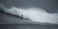 Surfers chase ‘the most difficult big wave in the world’ at Dungeons