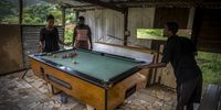 Community members enjoy a game of pool. (Photo: Shiraaz Mohamed)