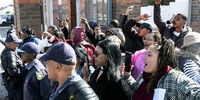 People wait for Raquel Smith to leave court after  the verdict was handed down in the Joshlin Smith kidnapping trial  in Saldanha Bay, South Africa.  (Photo: Gallo Images / Brenton Geach)