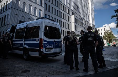 Putin critic Navalny under guard after likely poisoning, says Germany