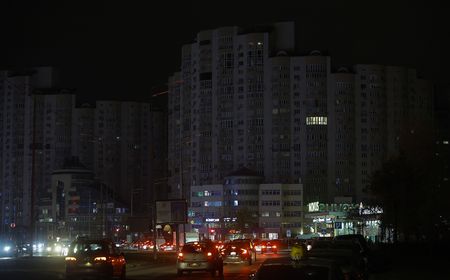 Ukraine rolls out power-saving steps as half of capital in dark after Russian strikes