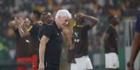 Hugo Broos, head coach of South Africa, shows his disappointment during the 2023 Africa Cup of Nations semifinal penalty shootout against Nigeria at Peace Stadium in Bouake, Cote DIvoire on 7 February 2024. (Gavin Barker / BackpagePix)