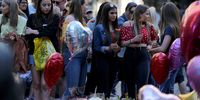 People lay flowers in St Ann’s Square, Manchester, on the first anniversary of the Manchester Arena bombing, 22 May 2018. (Photo: EPA-EFE / Nigel Roddis)